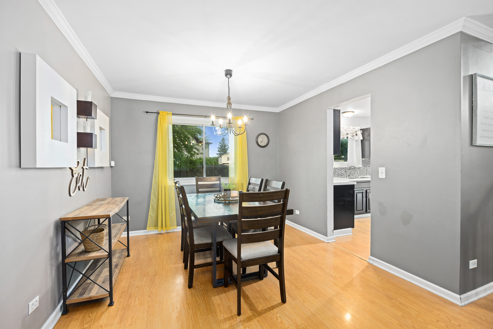 302 Thistle Drive Bolingbrook, IL 60490 - Photo 5 of 33 a view of a dining room with furniture window and outside view