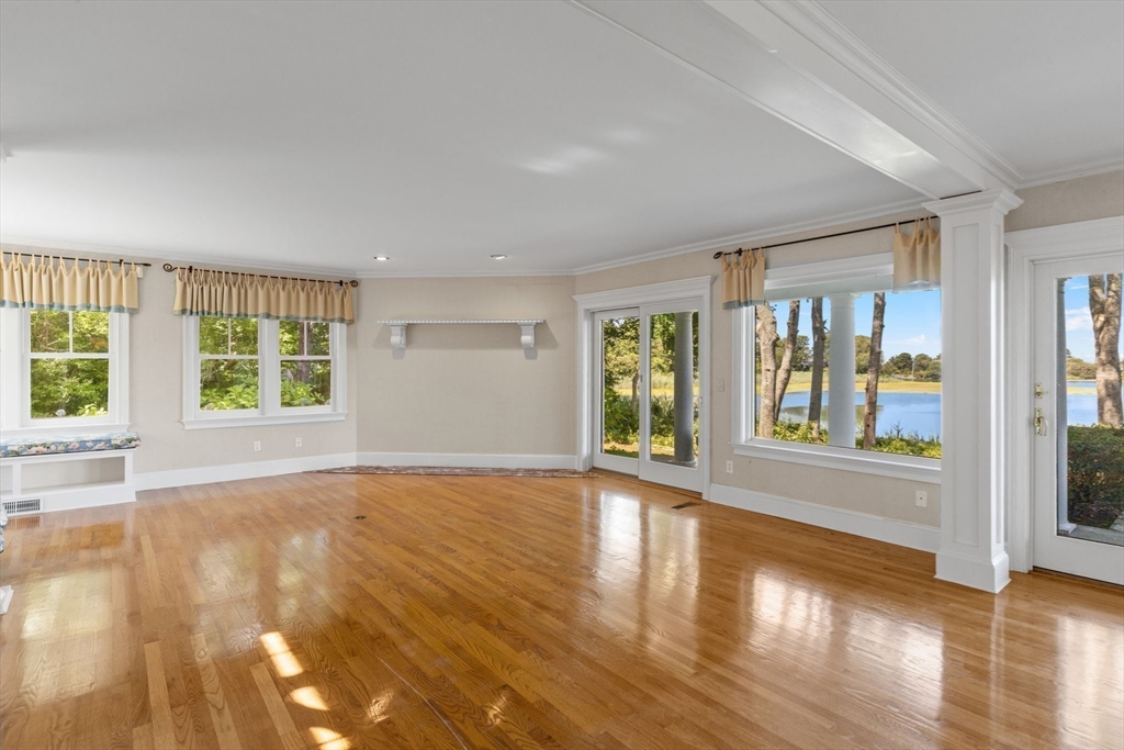 4390 Main Street Barnstable, MA 02675 - Photo 15 of 42 a view of an empty room with wooden floor and a window