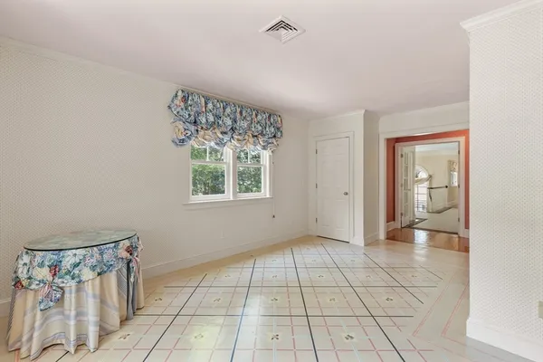 a view of an empty room and window