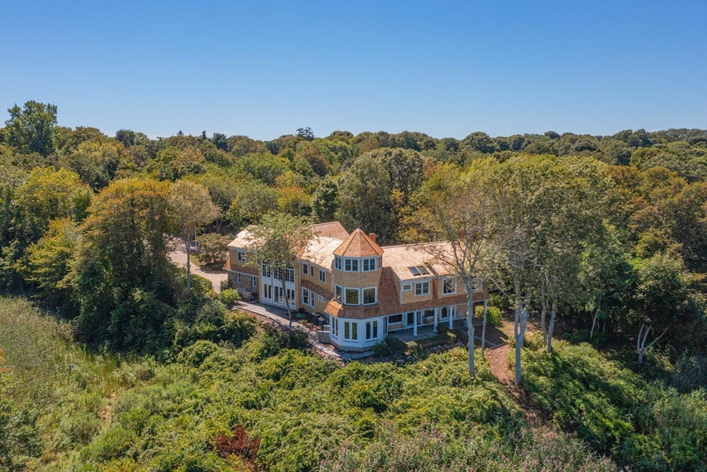 4390 Main Street Barnstable, MA 02675 - Photo 3 of 42 an aerial view of a house with a yard and mountain in the back