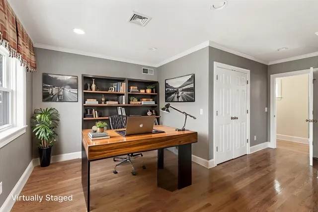 a view of a workspace with furniture
