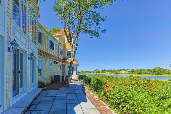 a view of a pathway with a yard