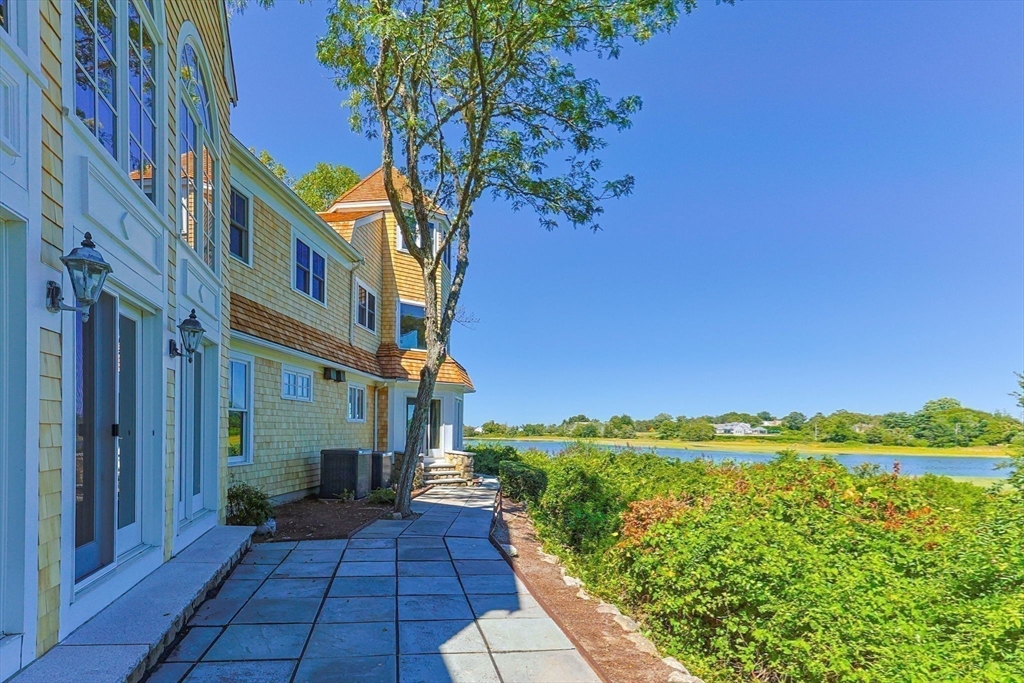 4390 Main Street Barnstable, MA 02675 - Photo 38 of 42 a view of a pathway with a yard