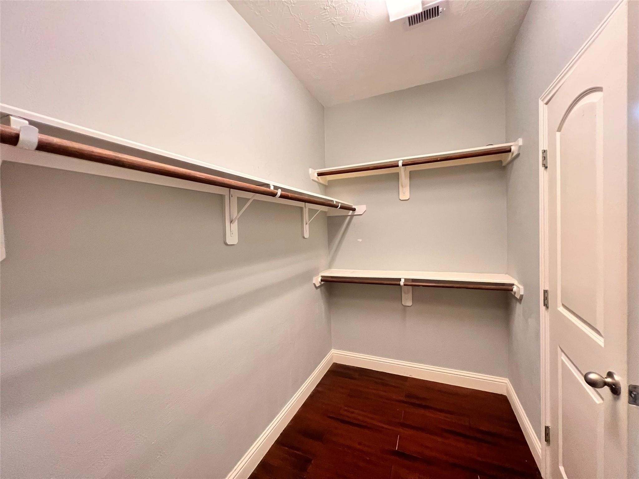 26842 Trinity Trail Cypress, TX 77433 - Photo 15 of 31 a view of walk in closet with empty racks