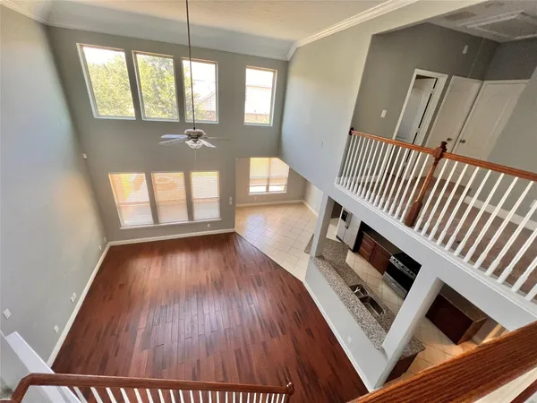 a view of an entryway with wooden floor