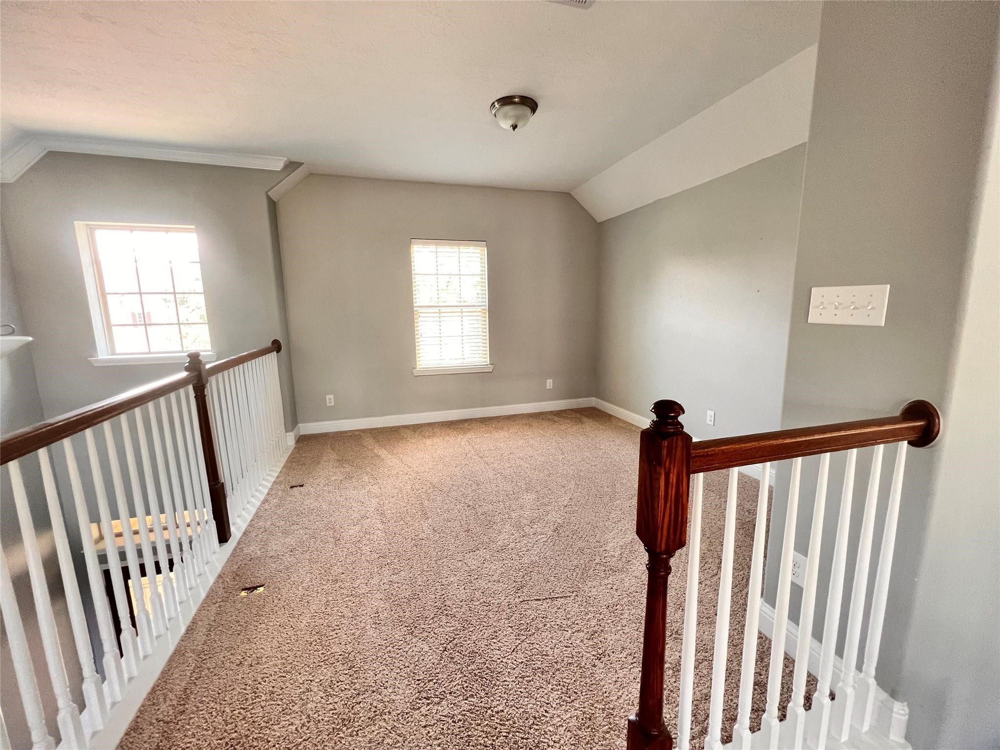 26842 Trinity Trail Cypress, TX 77433 - Photo 21 of 31 a view of a hallway with windows