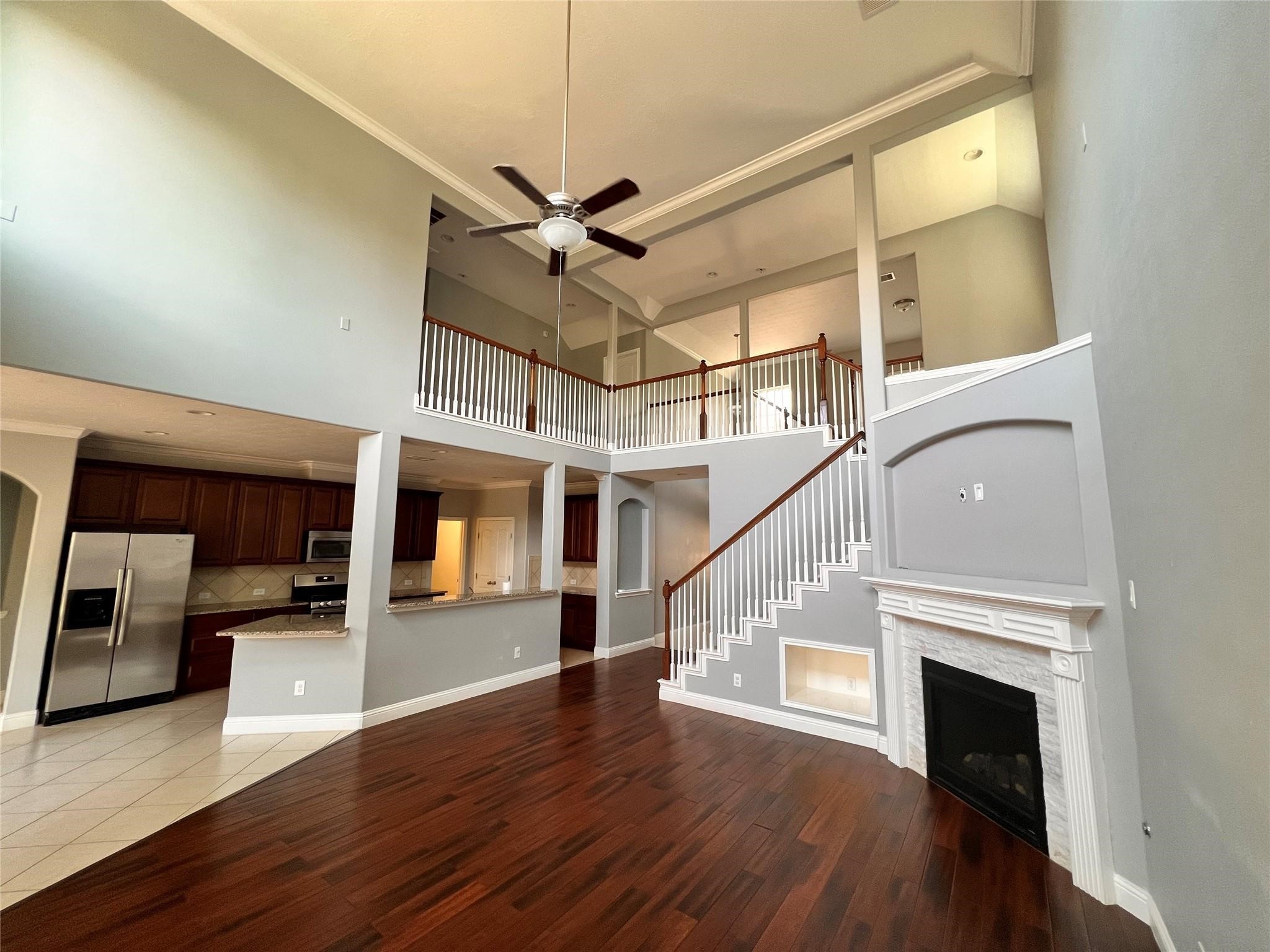 26842 Trinity Trail Cypress, TX 77433 - Photo 5 of 31 a view of entryway and hall with wooden floor