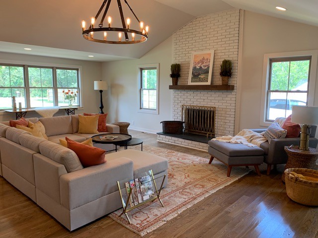 407 Bethlehem Road Lebanon, TN 37087 - Photo 3 of 39 a living room with furniture a fireplace and a chandelier