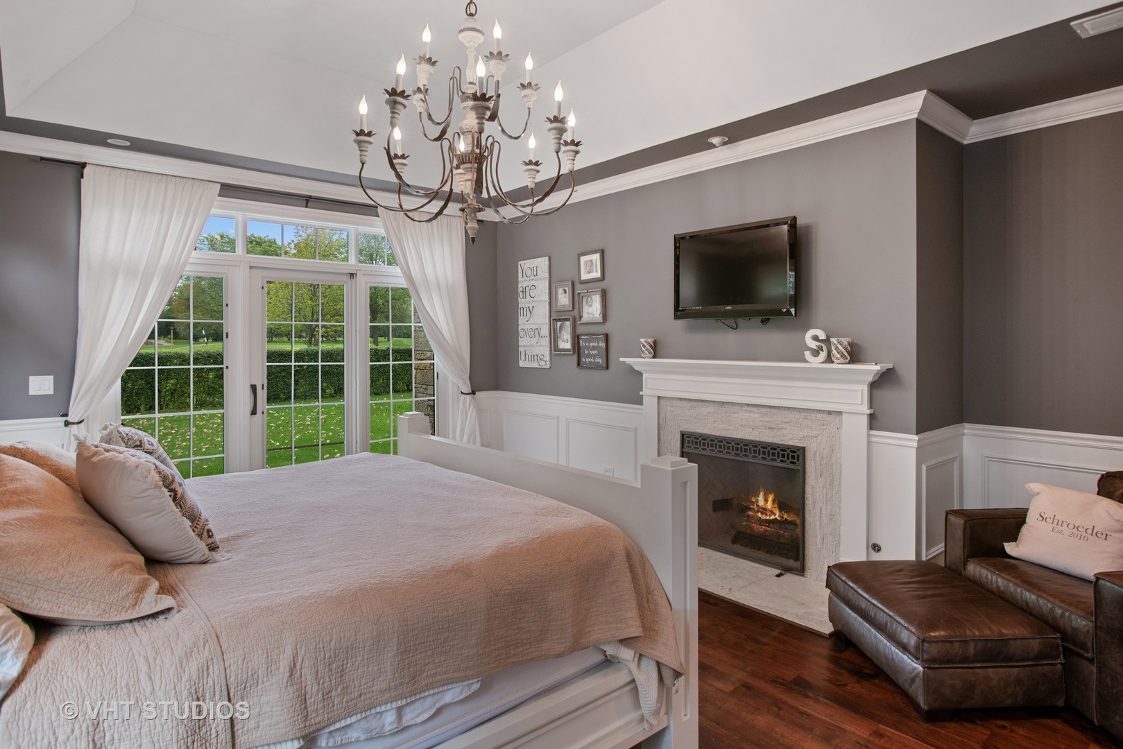 726 Hastings Street Park Ridge, IL 60068 - Photo 18 of 38 a spacious bedroom with a bed and a fireplace