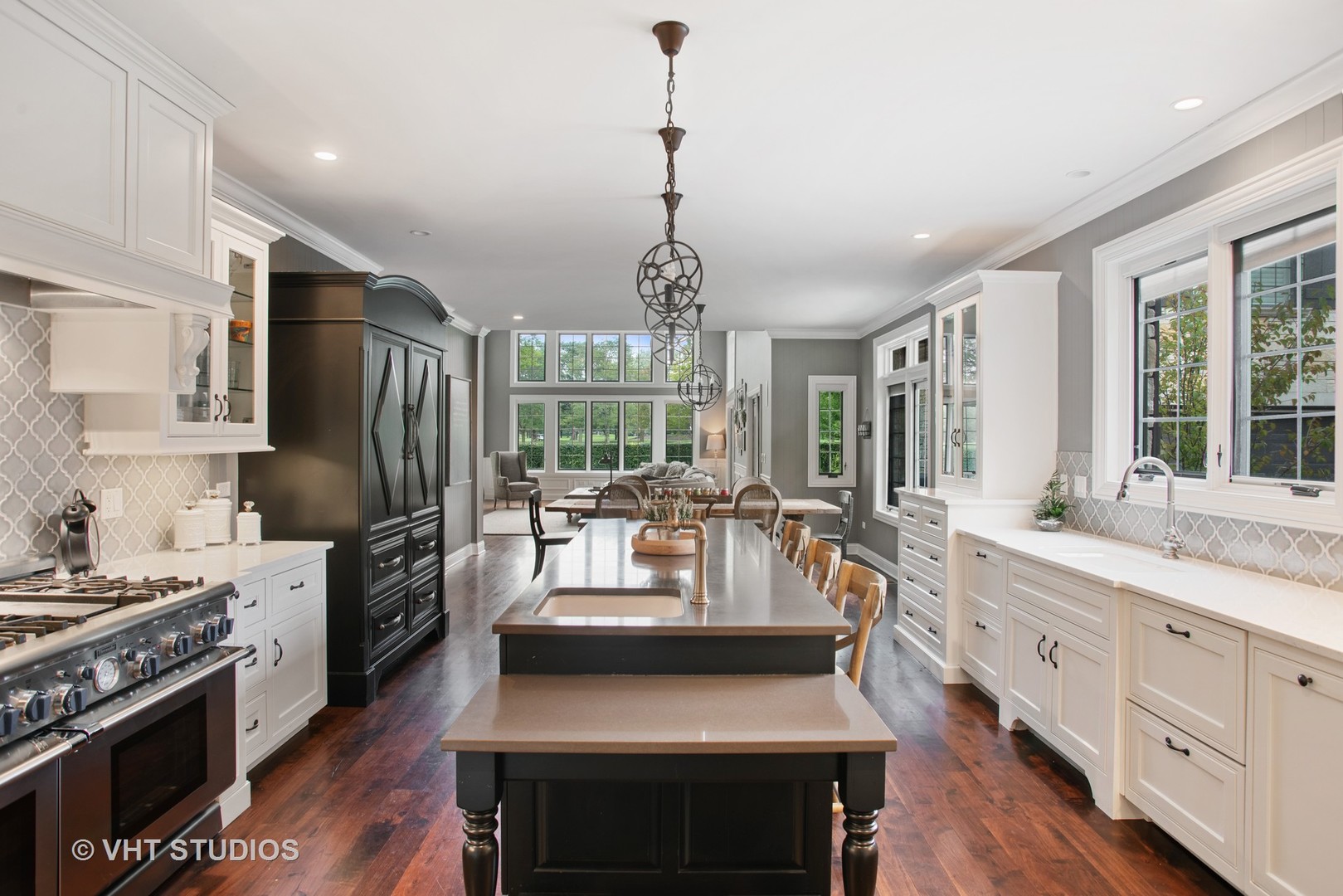 726 Hastings Street Park Ridge, IL 60068 - Photo 7 of 38 a kitchen with stainless steel appliances granite countertop a stove refrigerator and cabinets
