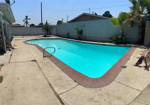 a view of a swimming pool with an outdoor space