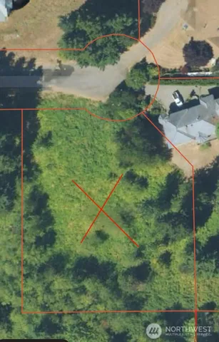 a backyard of a house with a yard and outdoor seating