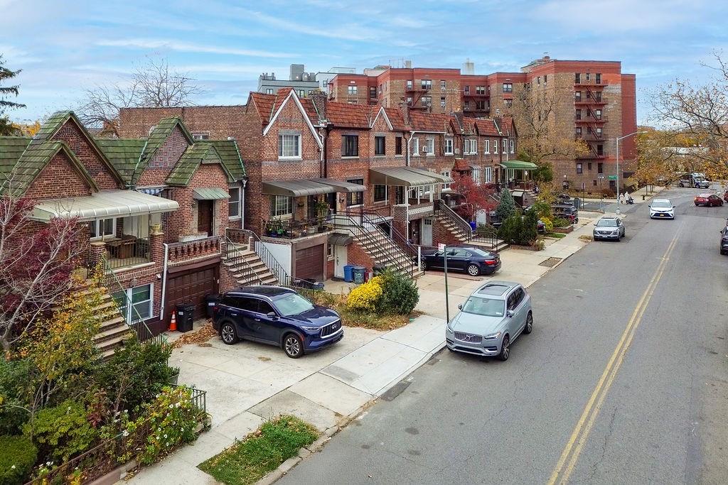 38 Corbin Place Brooklyn, NY 11235 - Photo 2 of 31 a picture of houses with the outdoor space