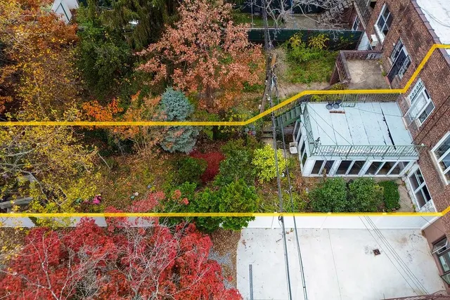 a view of swimming pool with a outdoor seating
