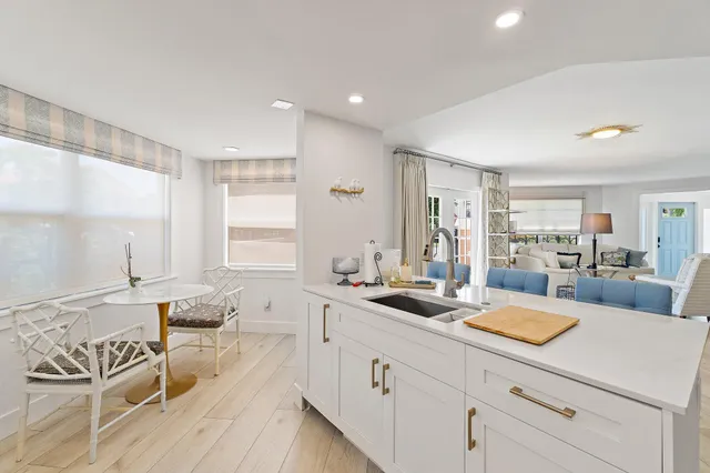 a view of living room with furniture and window