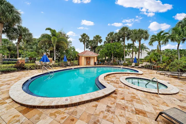 a view of outdoor space yard swimming pool and outdoor seating
