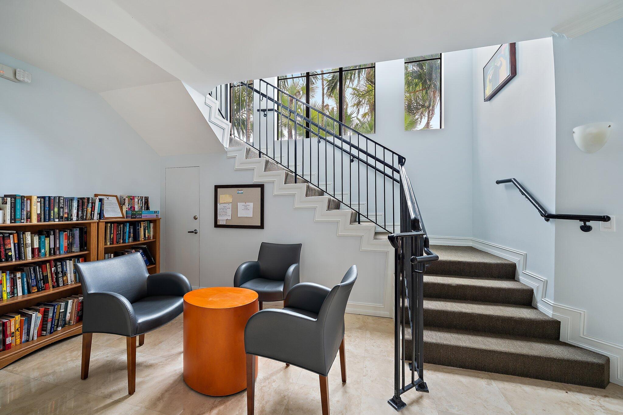 15 Uno Lago Drive, Unit 15 Juno Beach, FL 33408 - Photo 42 of 50 a view of entryway and hall with wooden floor