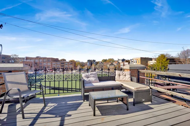 a view of a terrace with seating area