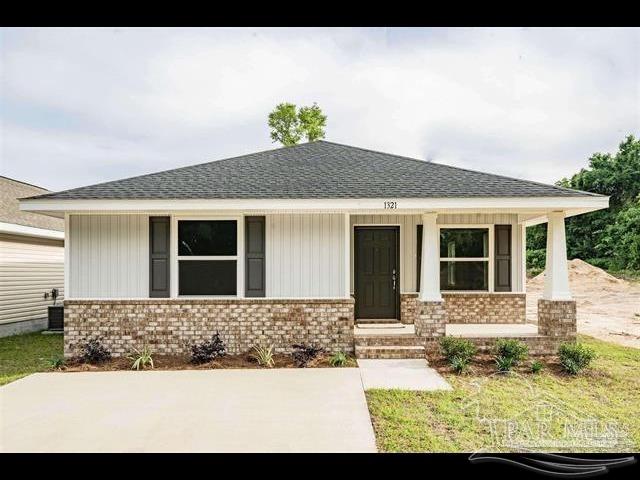 8085 Westpointe Lane, Unit 2B Pensacola, FL 32506 - Photo 1 of 3 a front view of a house with a porch