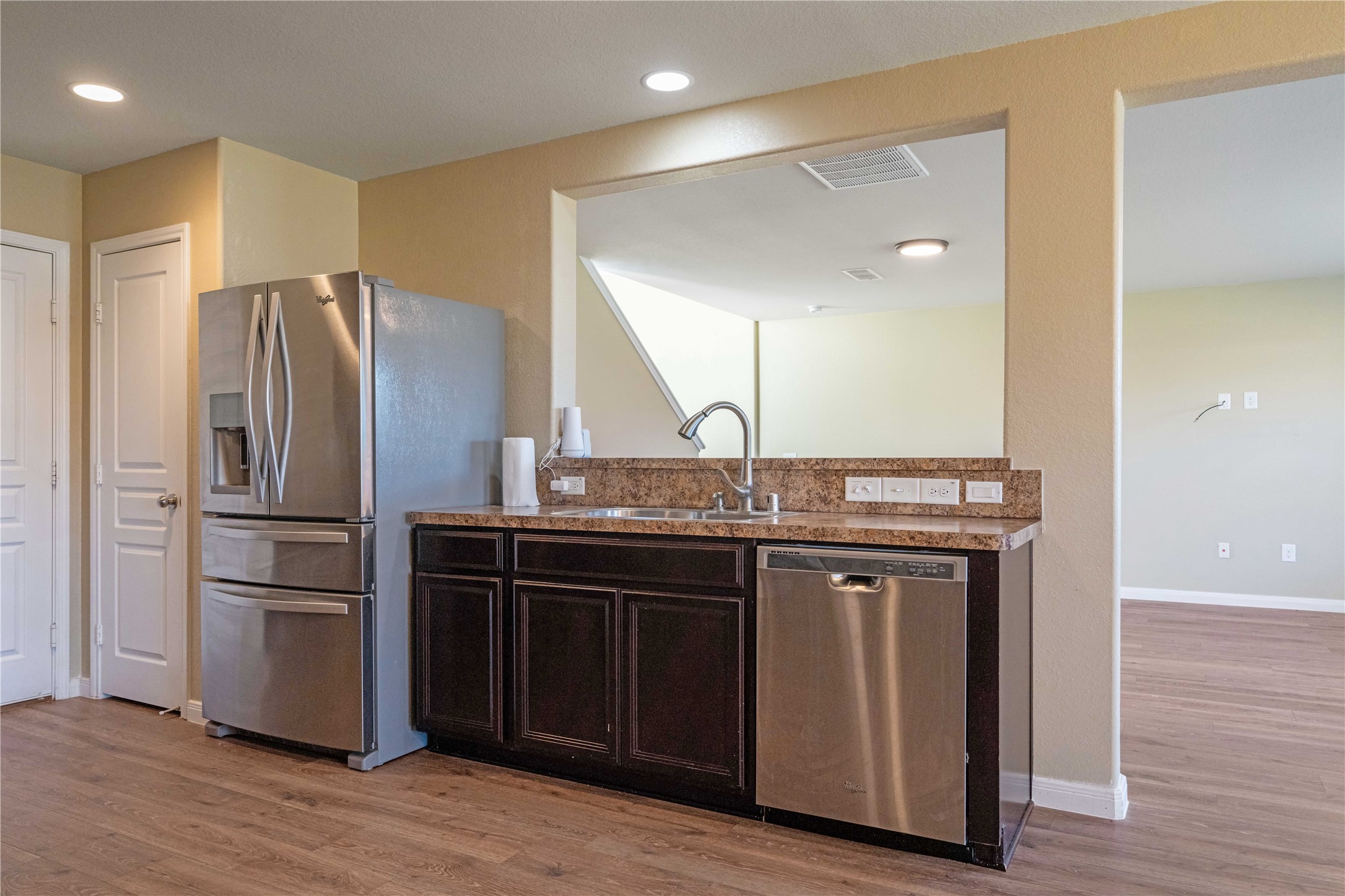10011 Orchid Spring Lane Houston, TX 77044 - Photo 20 of 42 a kitchen with stainless steel appliances granite countertop a refrigerator and a sink