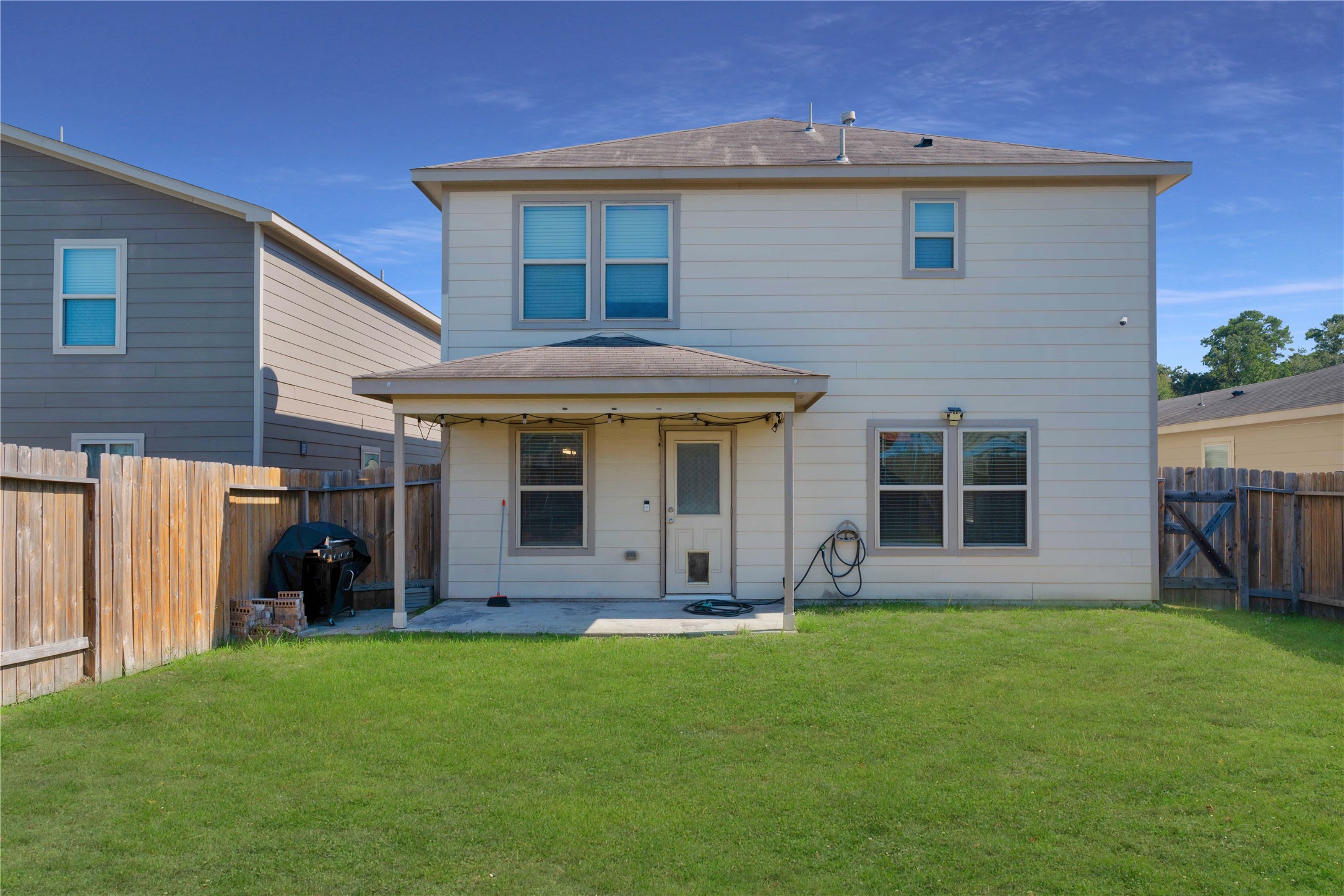 10011 Orchid Spring Lane Houston, TX 77044 - Photo 41 of 42 a view of a house with a yard