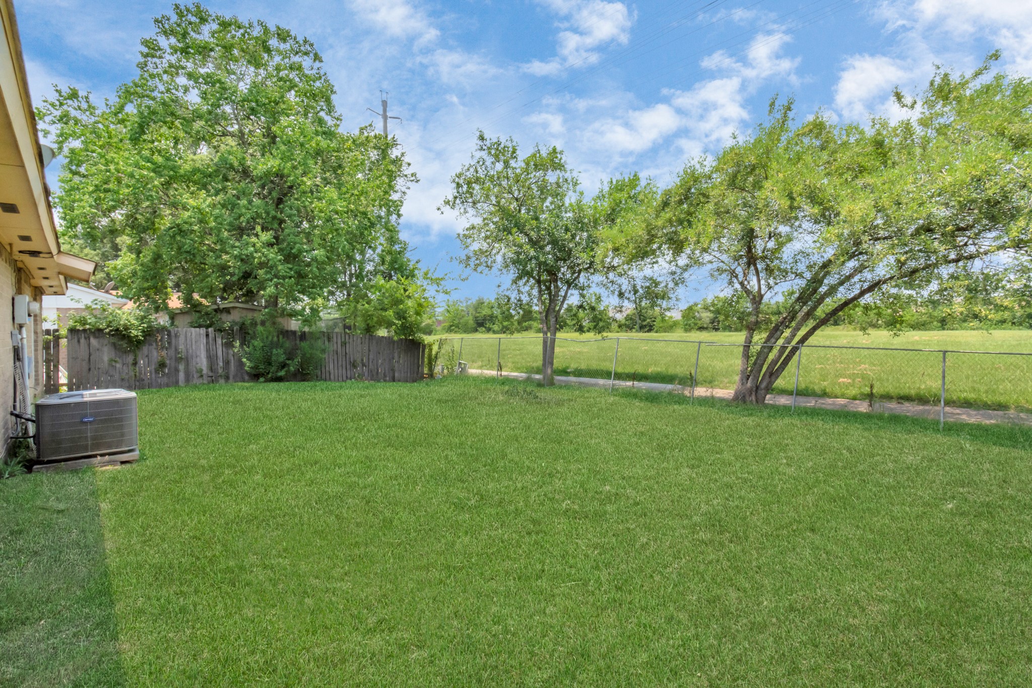 14519 Edenglen Drive Houston, TX 77049 - Photo 30 of 32 a view of a park with a tree