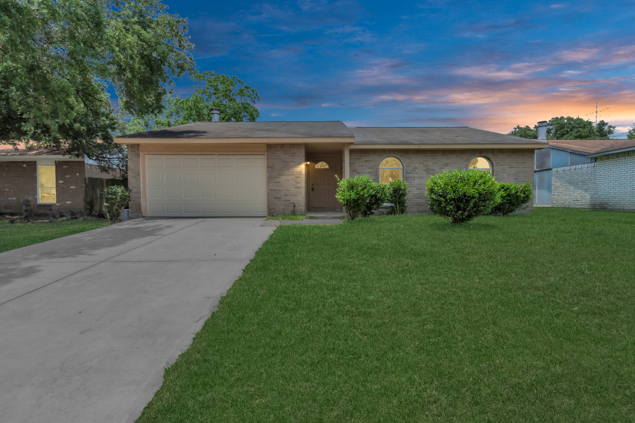 14519 Edenglen Drive Houston, TX 77049 - Photo 3 of 32 front view of a house with a yard