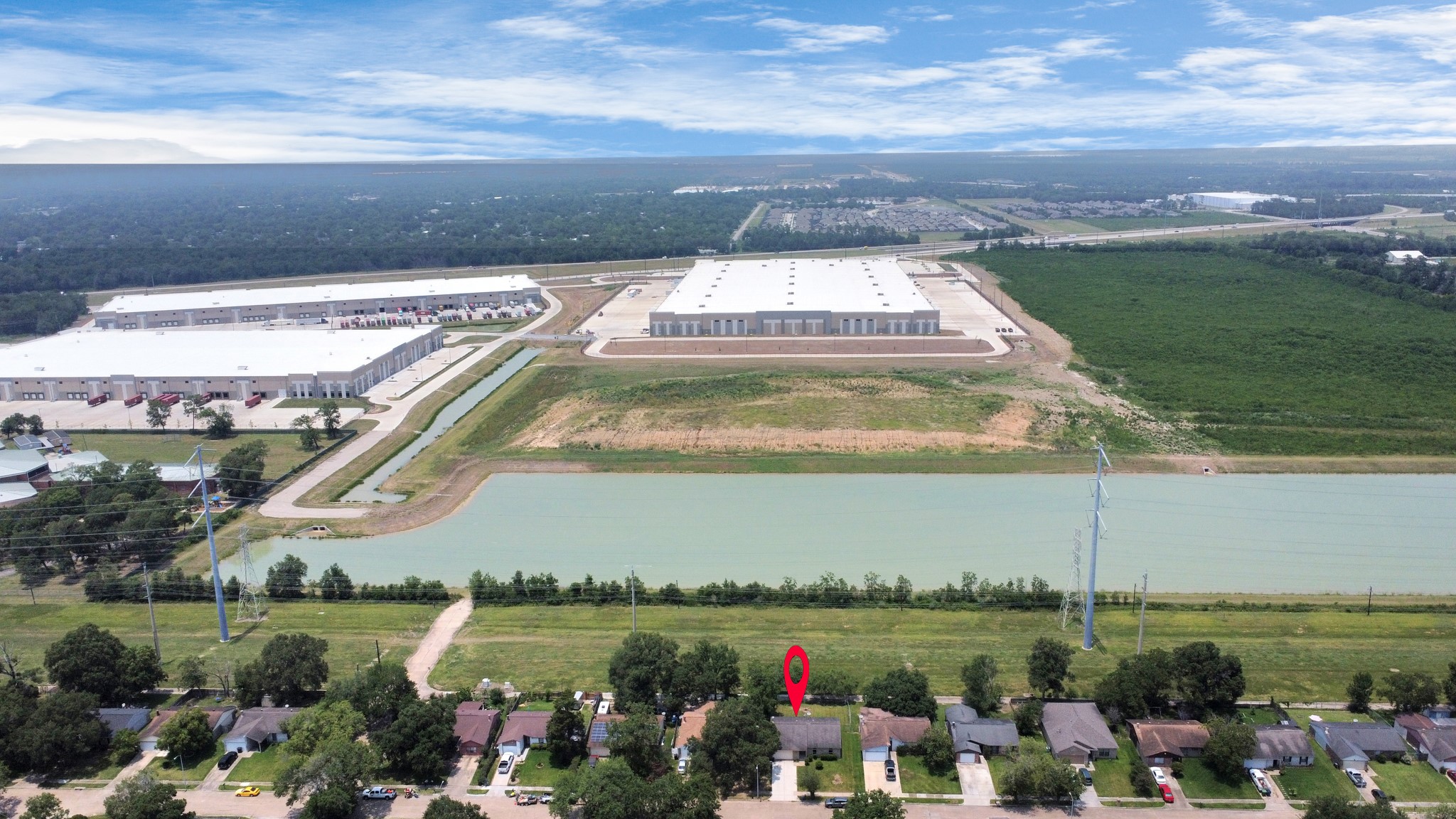 14519 Edenglen Drive Houston, TX 77049 - Photo 32 of 32 a view of a lake with a big yard and potted plants