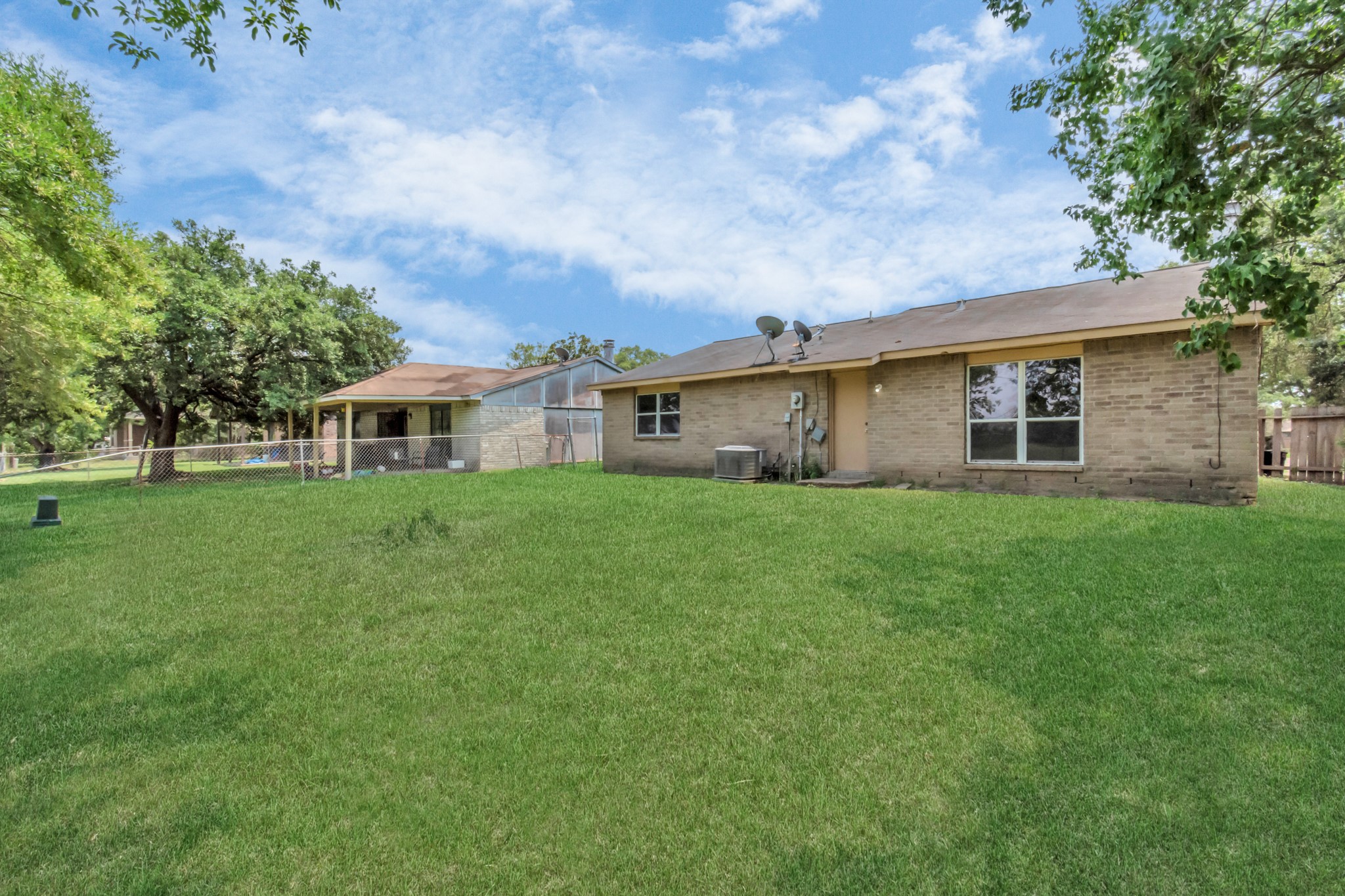 14519 Edenglen Drive Houston, TX 77049 - Photo 5 of 32 a house view with a garden space