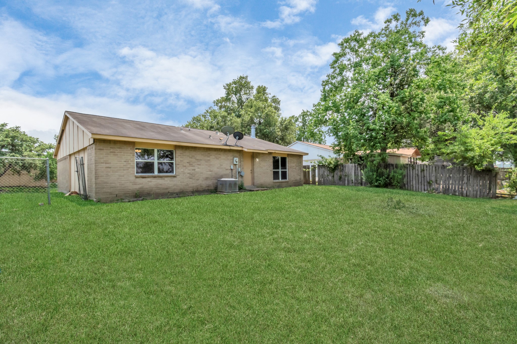 14519 Edenglen Drive Houston, TX 77049 - Photo 6 of 32 a view of a house with backyard and garden