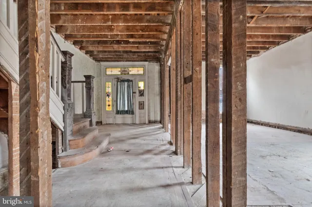 a view of a room with wooden walls