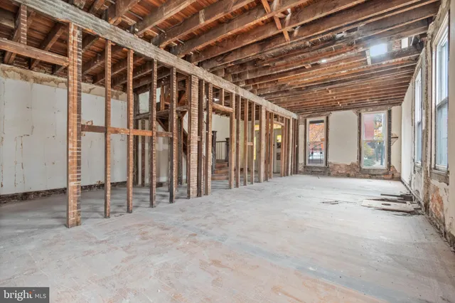 a view of a brick buildings with entryway doors