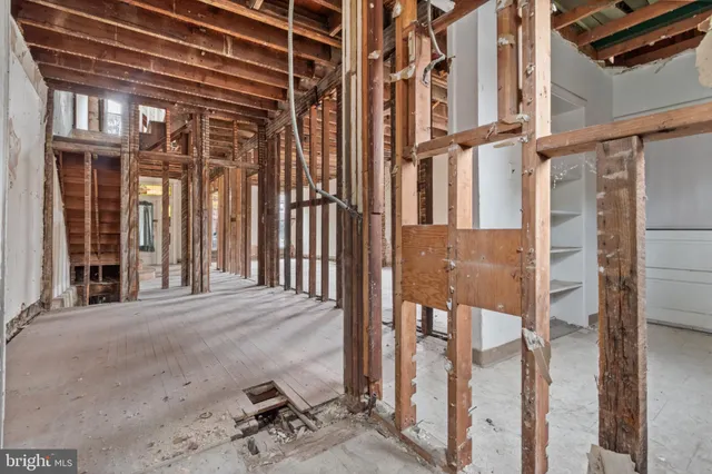 a view of a room with wooden walls