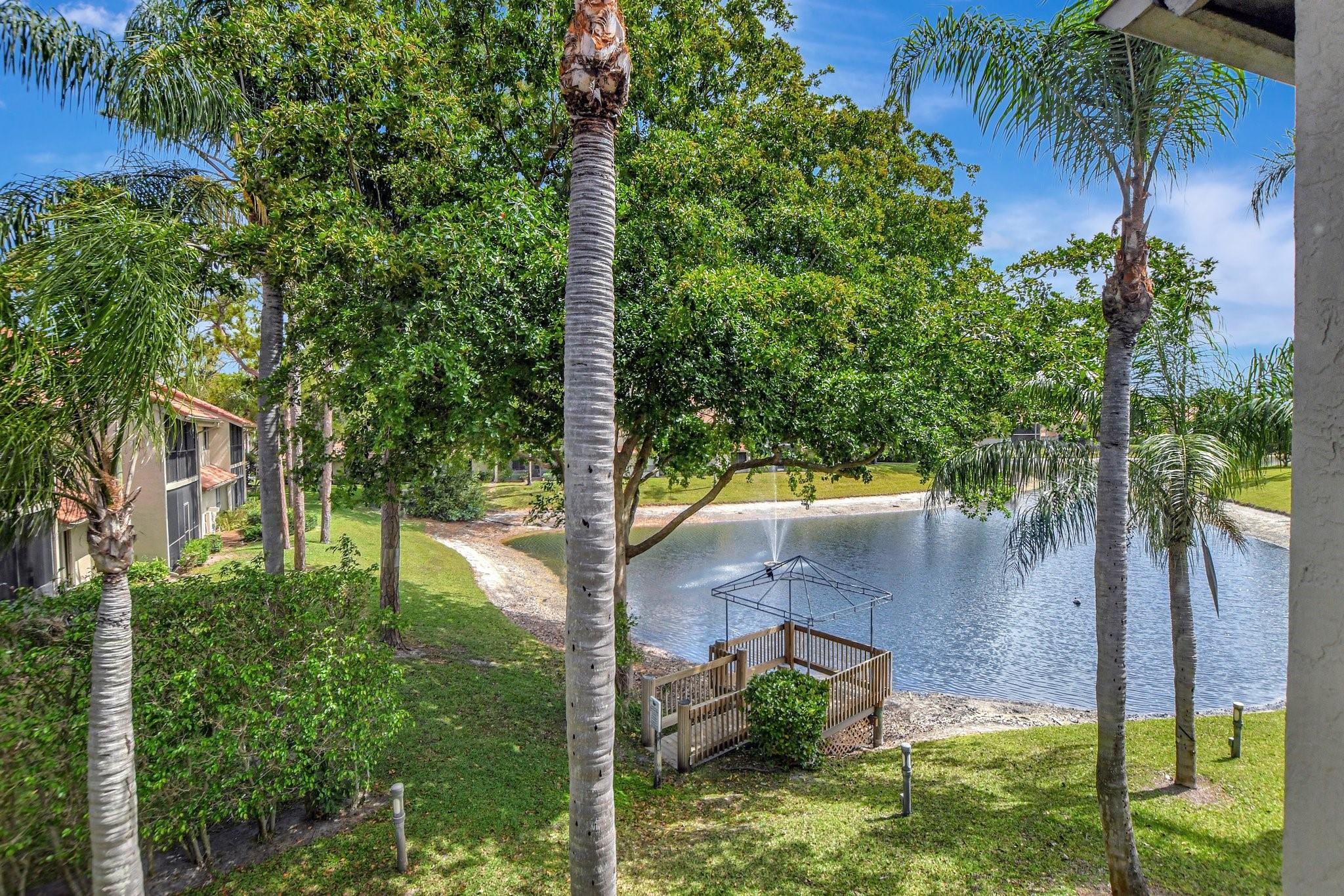 5801 Coach House Circle, Unit E Boca Raton, FL 33486 - Photo 24 of 41 Mature trees!