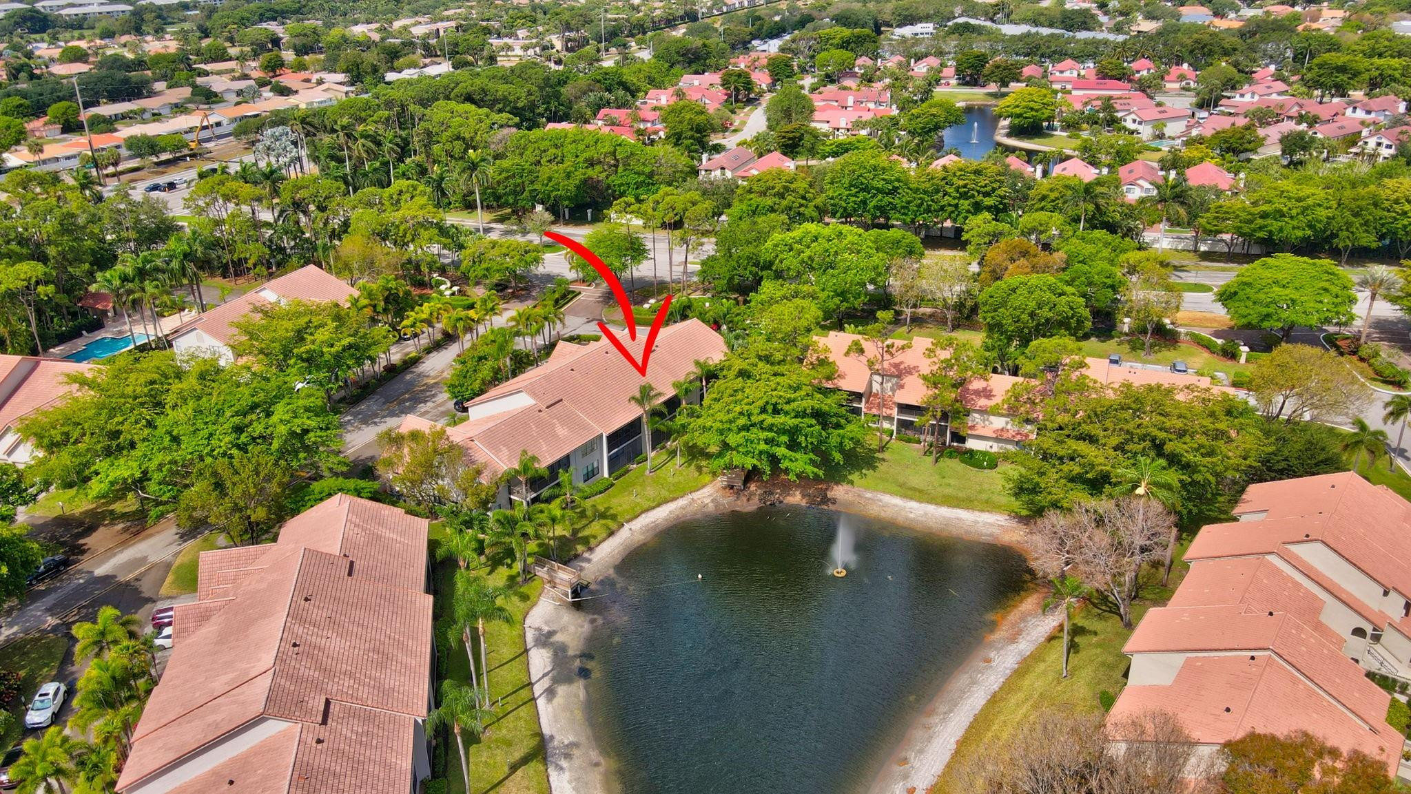 5801 Coach House Circle, Unit E Boca Raton, FL 33486 - Photo 30 of 41 Lake and fountain views.