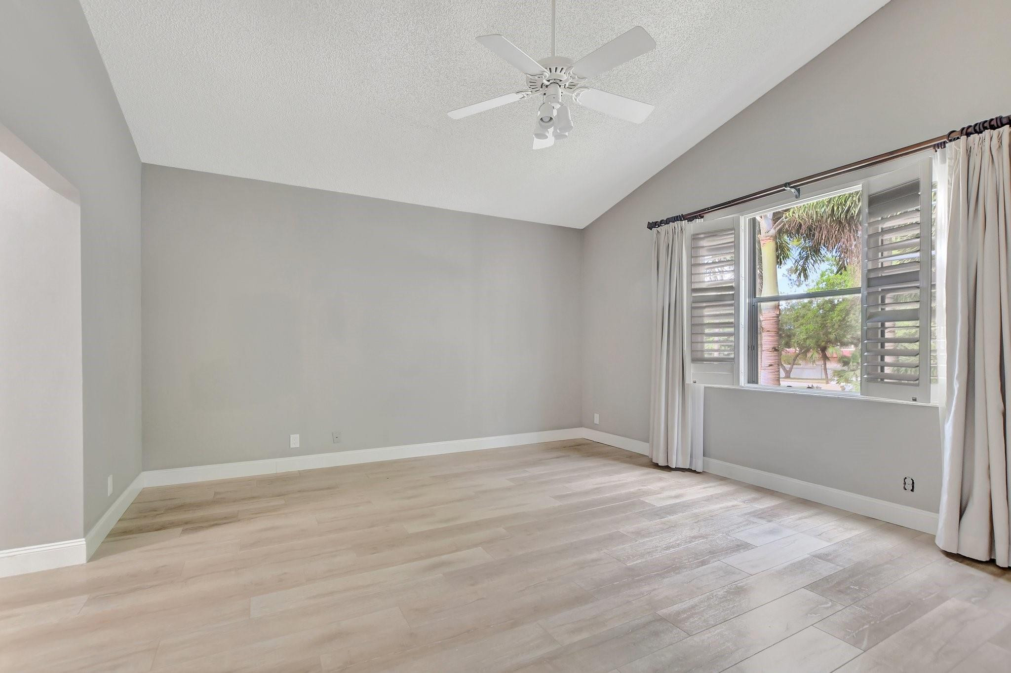 5801 Coach House Circle, Unit E Boca Raton, FL 33486 - Photo 37 of 41 OVERSIZED Primary suite with 2 closets.