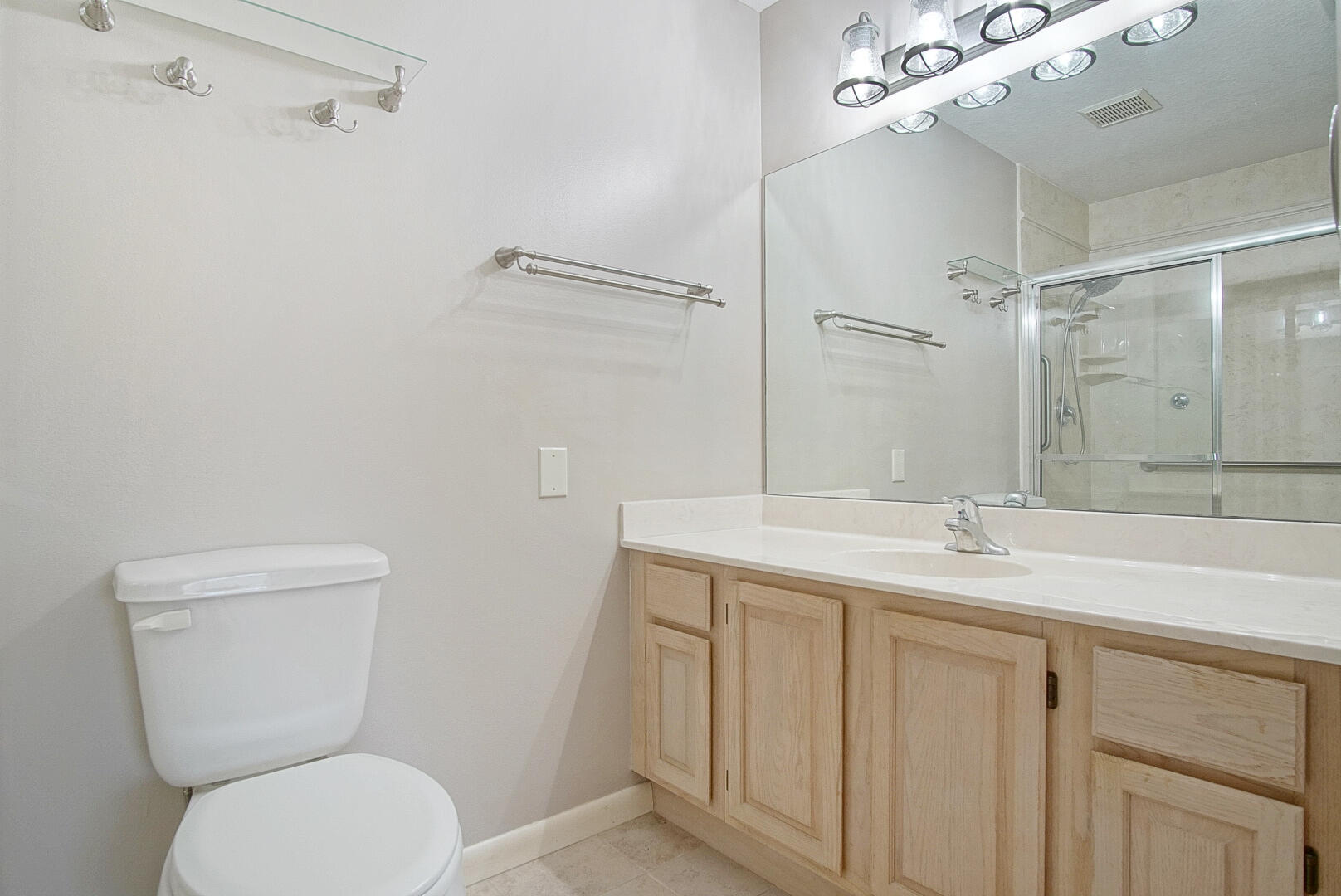 2321 Southwest 3rd Court Okeechobee, FL 34974 - Photo 11 of 37 a bathroom with a sink a toilet and shower