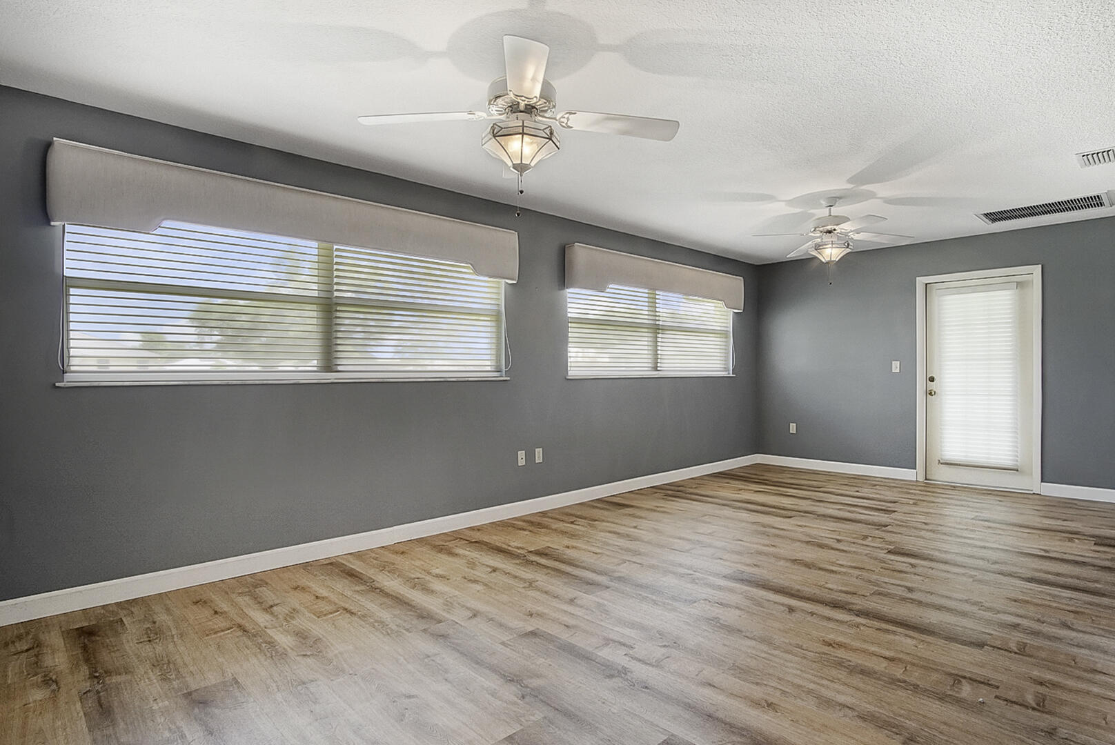2321 Southwest 3rd Court Okeechobee, FL 34974 - Photo 18 of 37 a view of an empty room with a window