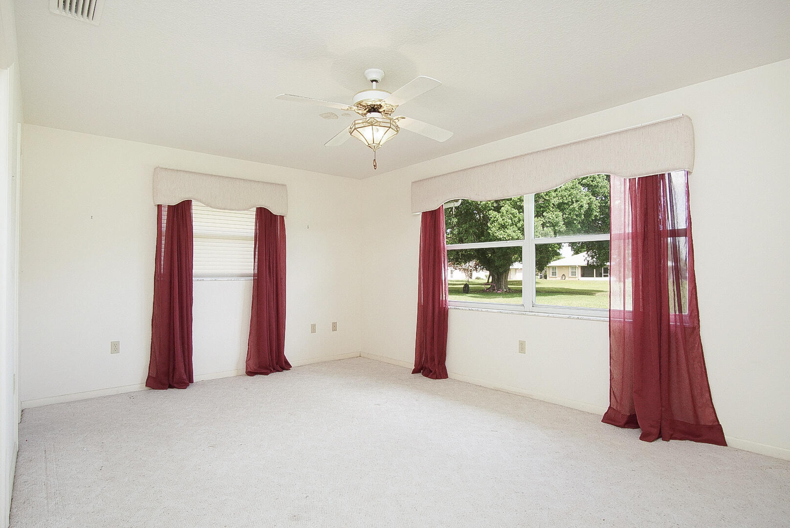 2321 Southwest 3rd Court Okeechobee, FL 34974 - Photo 19 of 37 a view of an empty room with a window