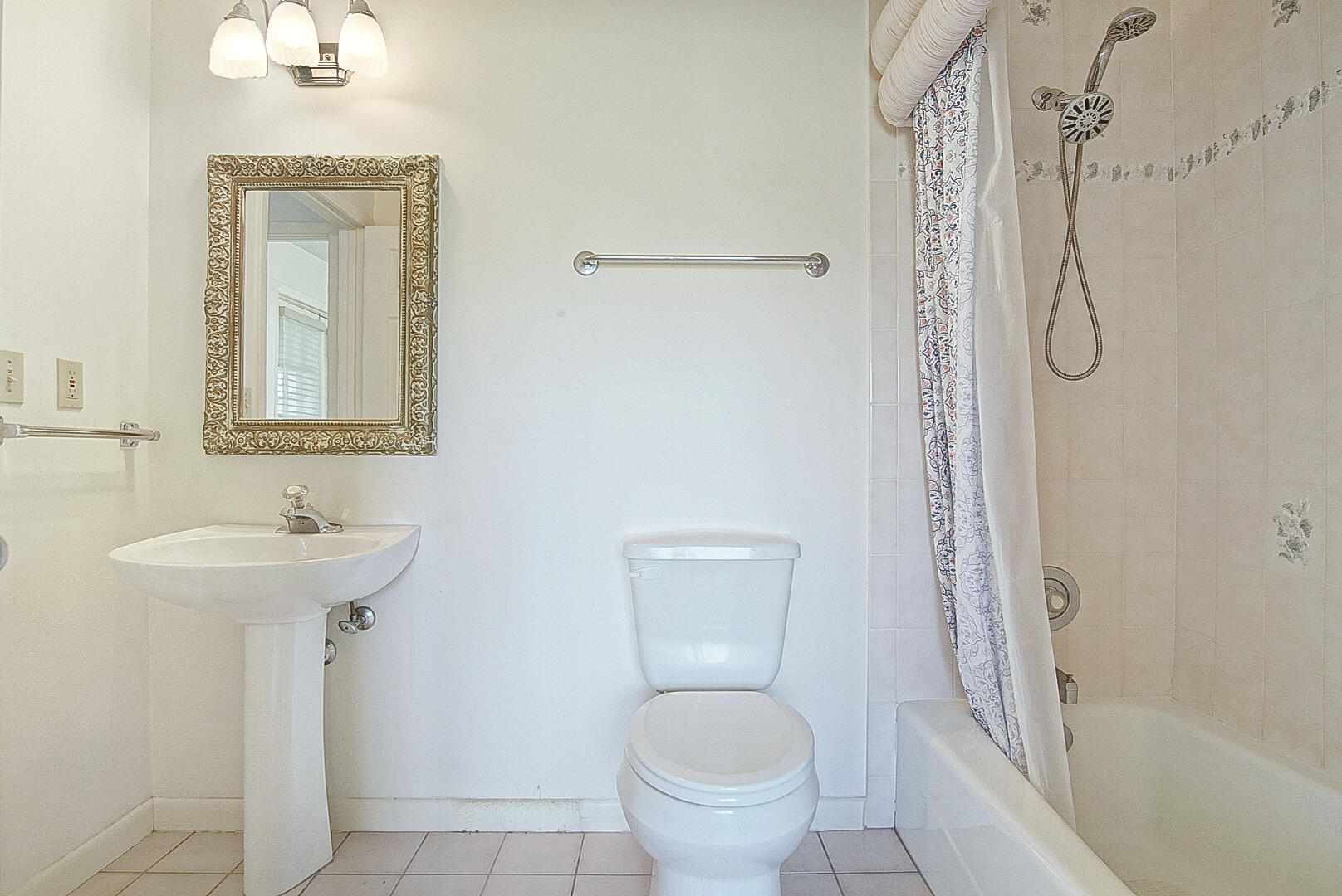 2321 Southwest 3rd Court Okeechobee, FL 34974 - Photo 21 of 37 a bathroom with a sink toilet and shower