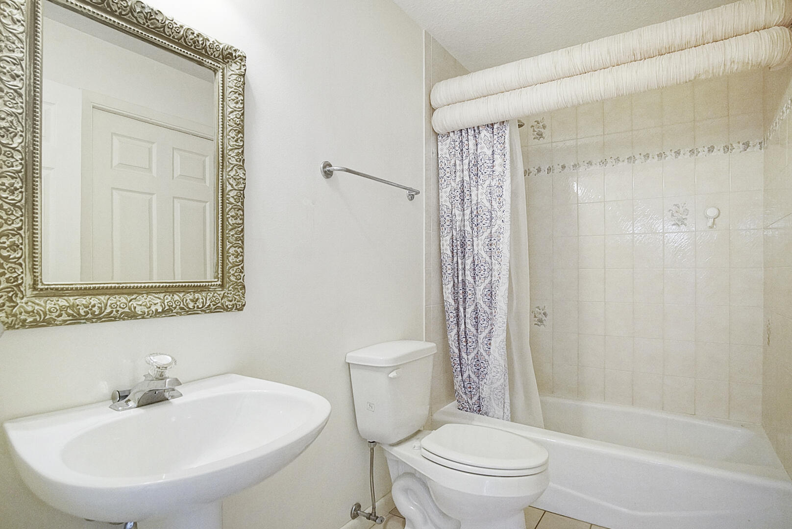 2321 Southwest 3rd Court Okeechobee, FL 34974 - Photo 22 of 37 a bathroom with a sink toilet and shower