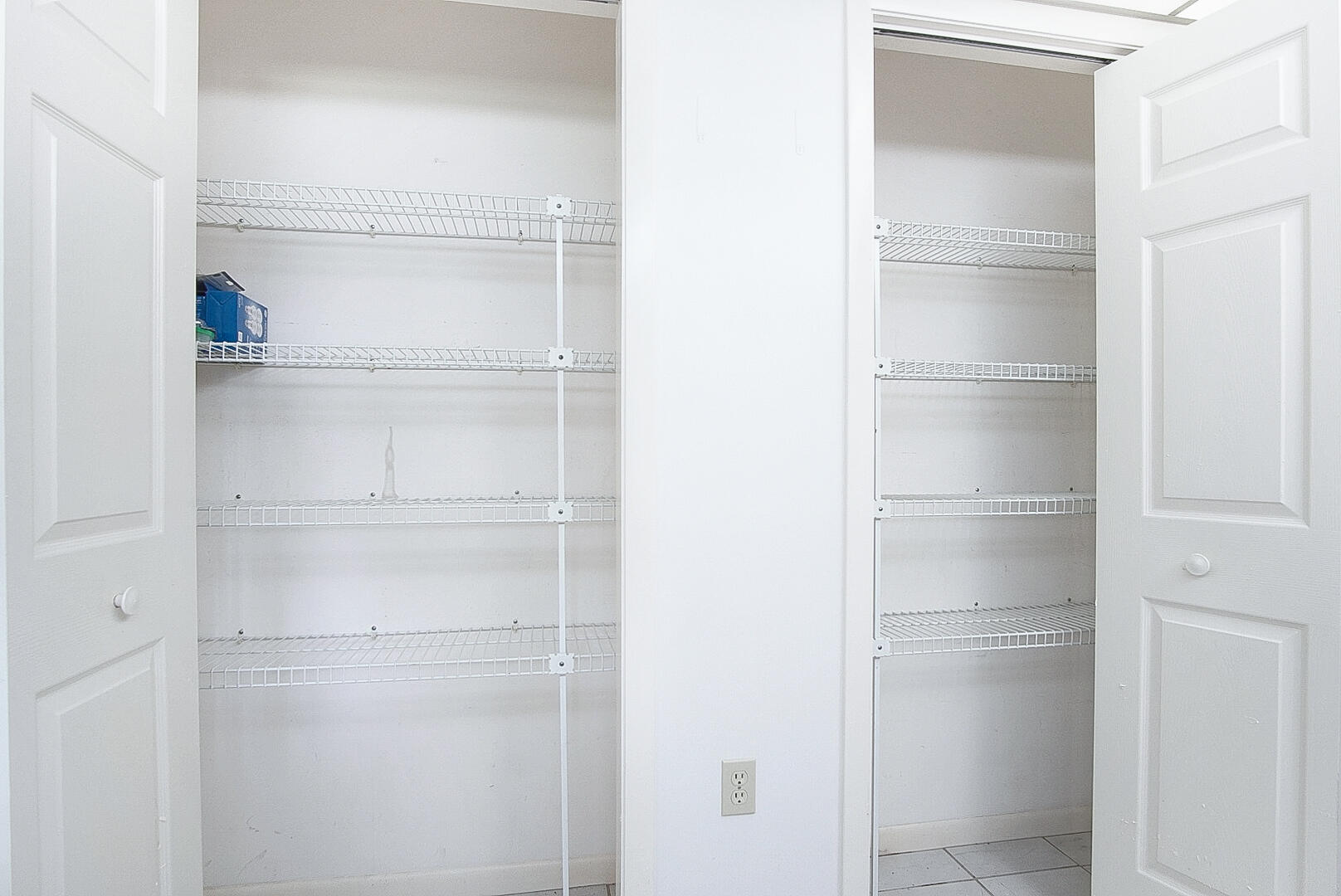 2321 Southwest 3rd Court Okeechobee, FL 34974 - Photo 29 of 37 a close view of walk in closet with empty racks