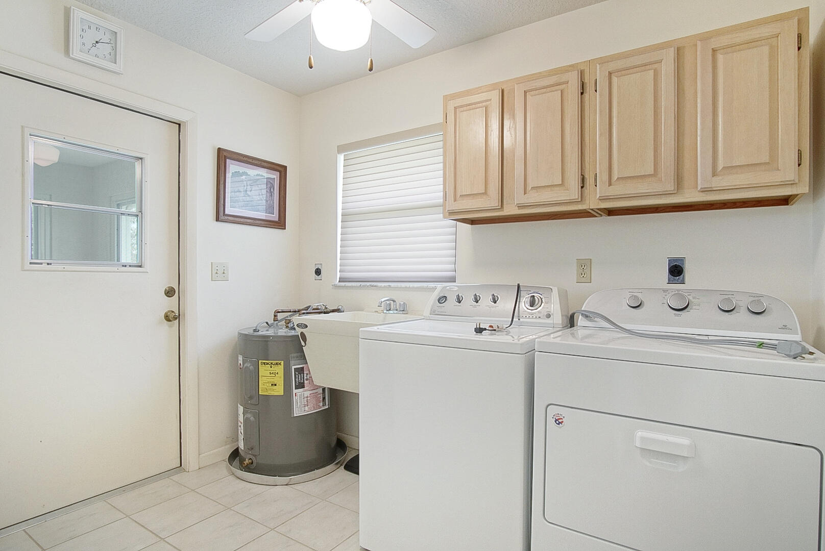 2321 Southwest 3rd Court Okeechobee, FL 34974 - Photo 31 of 37 a utility room with dryer and washer