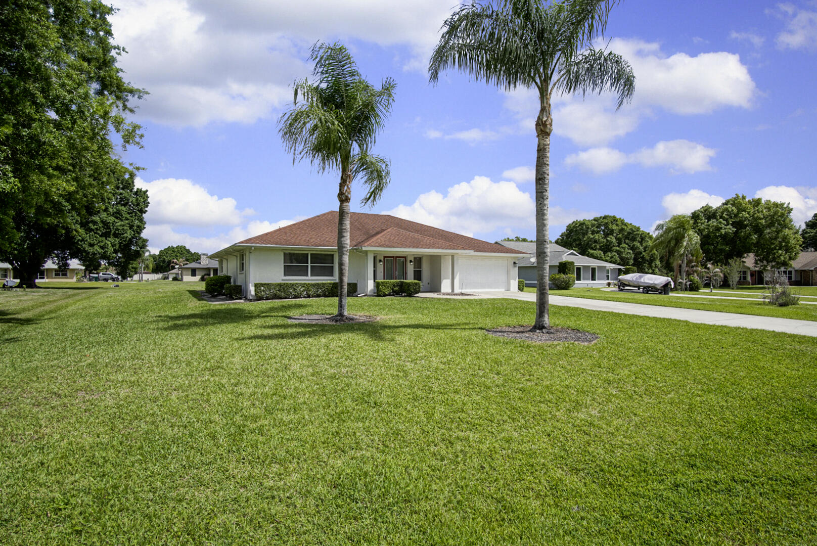 2321 Southwest 3rd Court Okeechobee, FL 34974 - Photo 35 of 37 a house view with a garden space