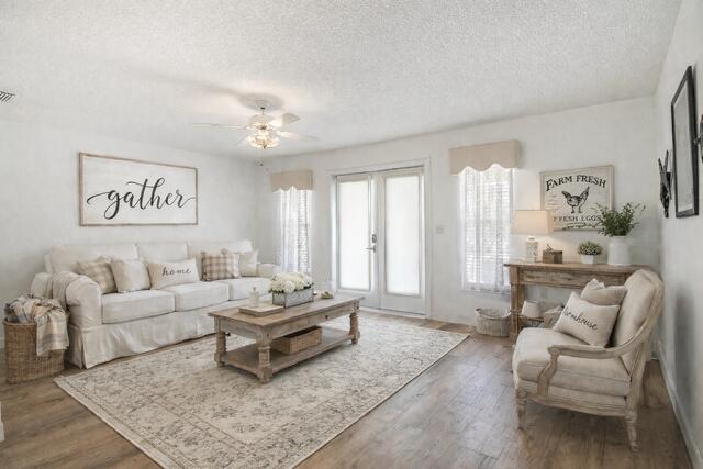 2321 Southwest 3rd Court Okeechobee, FL 34974 - Photo 6 of 35 a living room with furniture a rug and a chandelier