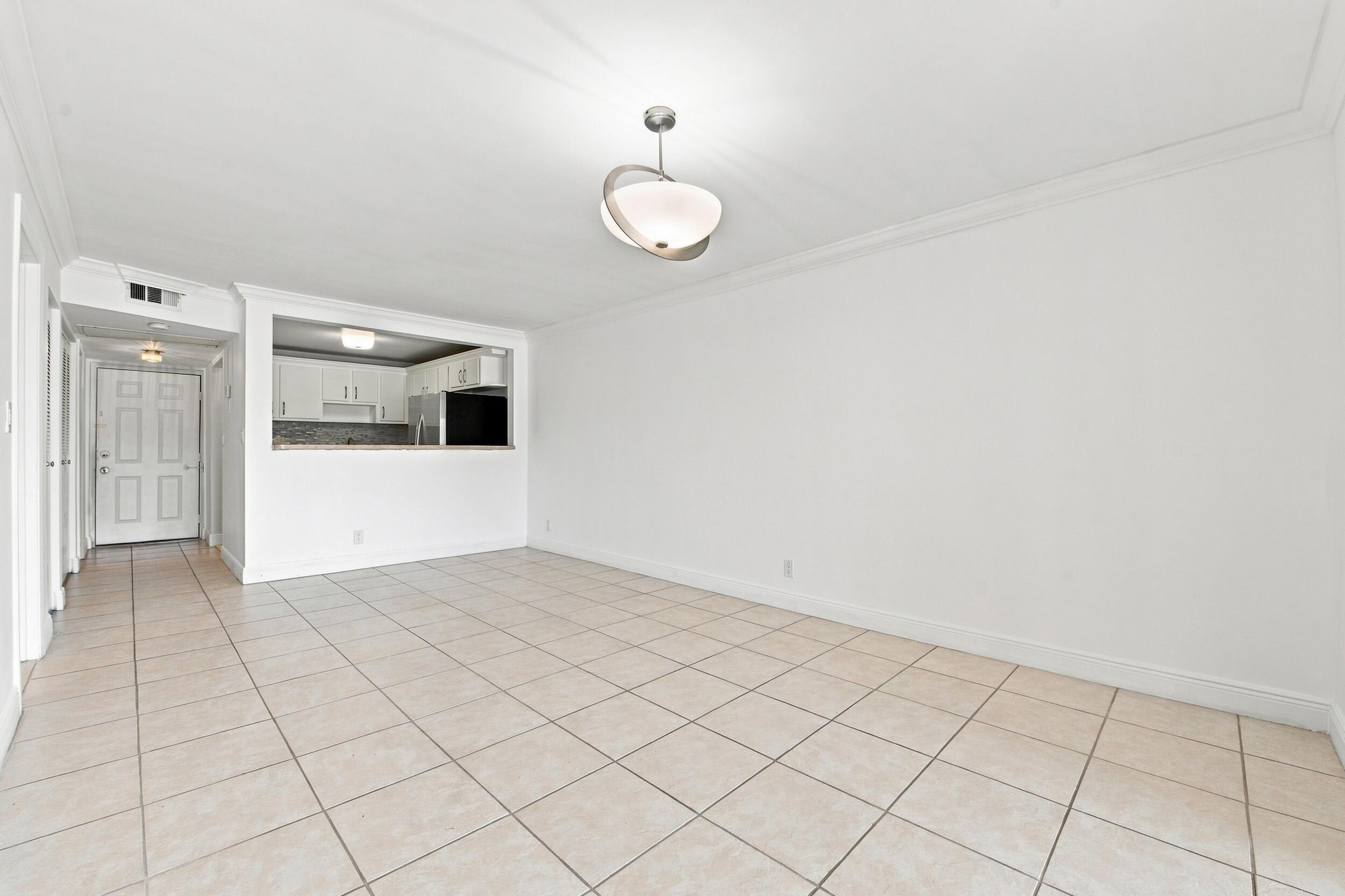 9300 Southwest 8th Street, Unit 219 Boca Raton, FL 33428 - Photo 6 of 26 Living room