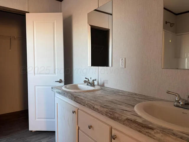 a kitchen with a sink stove and refrigerator