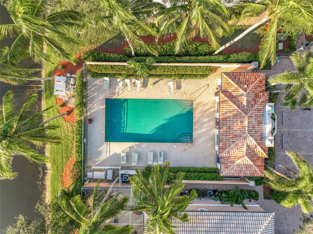 5721 Cove Circle, Unit 36 Naples, FL 34119 - Photo 31 of 32 a view of small yard