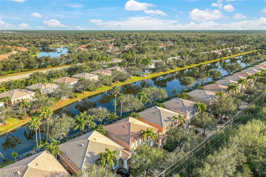 5721 Cove Circle, Unit 36 Naples, FL 34119 - Photo 32 of 32 an aerial view of residential building with outdoor space