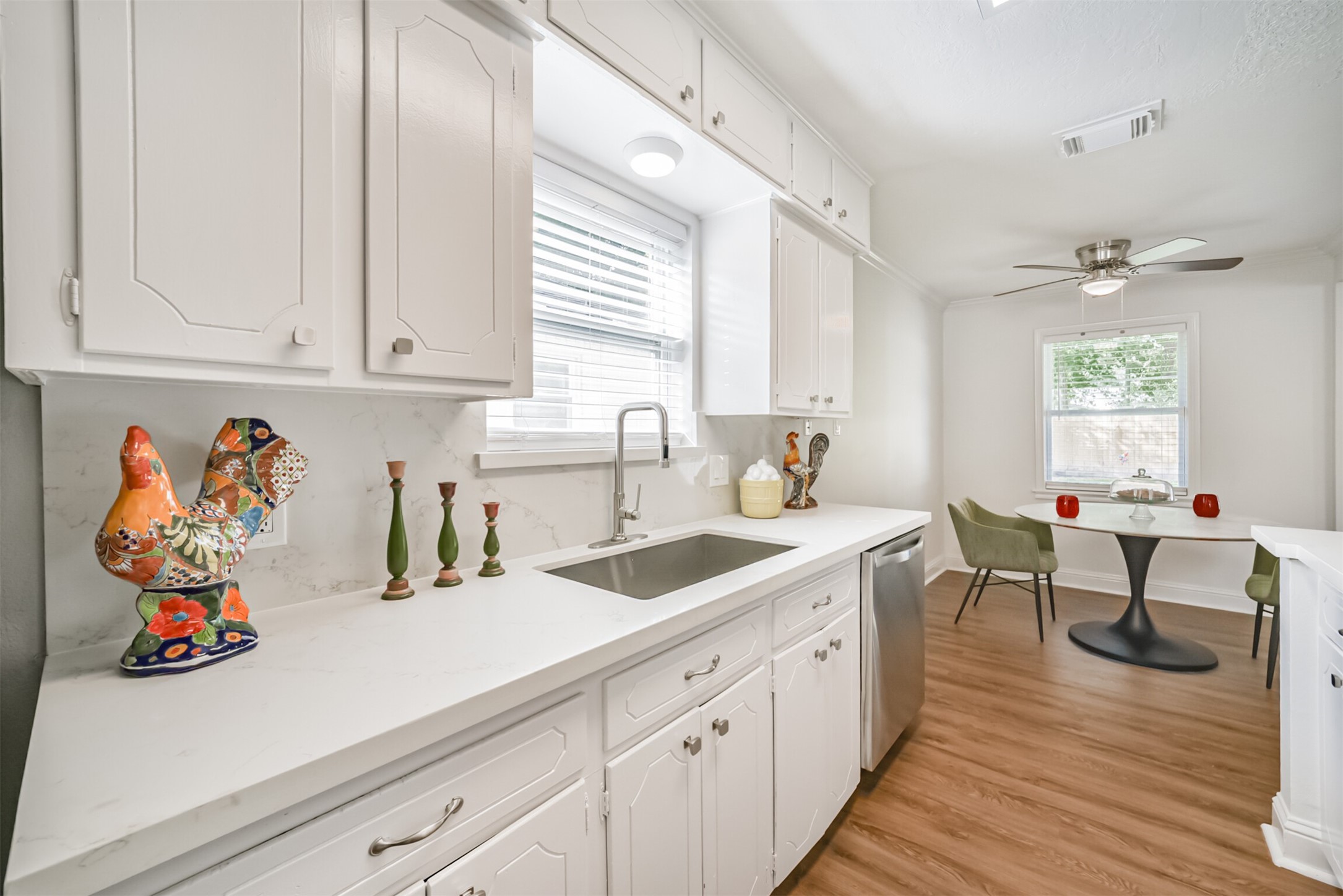 3319 Springrock Lane Houston, TX 77080 - Photo 12 of 41 a kitchen with a sink and cabinets